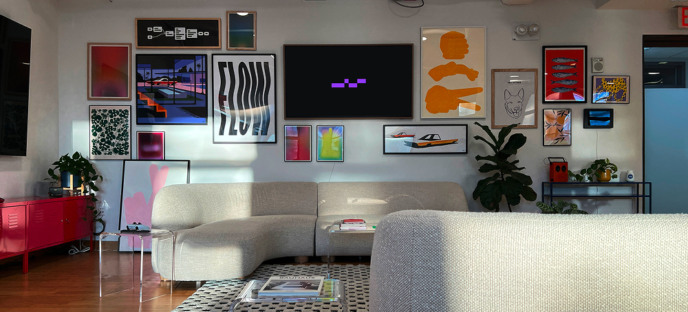 Thread AI office interior with a sofa, magazines, and paintings displayed