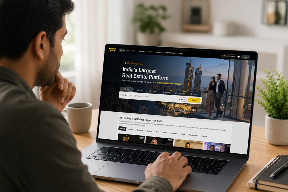 Man views Square Yards, India's largest real estate platform, on a laptop.