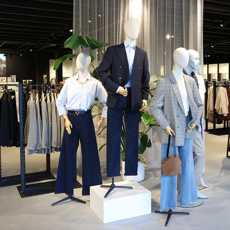 Mannequins styled in smart casual blazers and jeans at e5