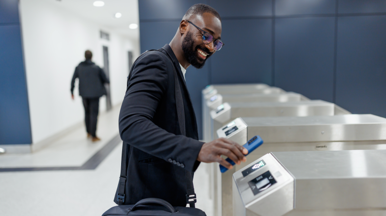 person going through metro payment scan
