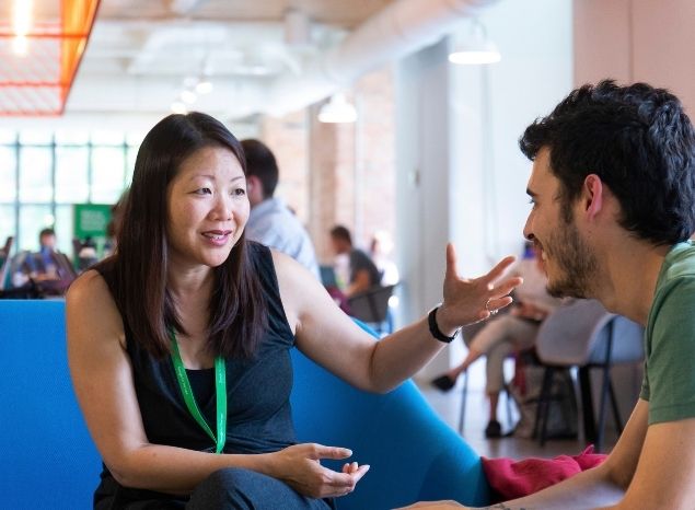 A founder explaining a concept to a fellow founder