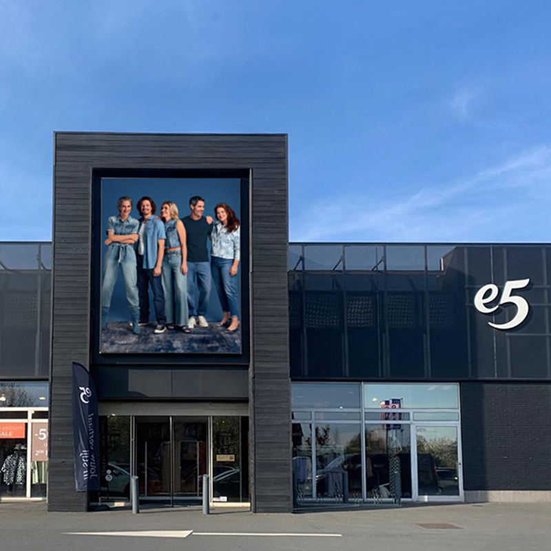 Exterior of e5 fashion store with digital display