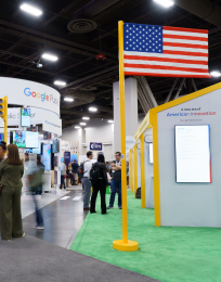 conference attendees visit the Google Public Sector show floor spaces at Google Cloud Next 2026.