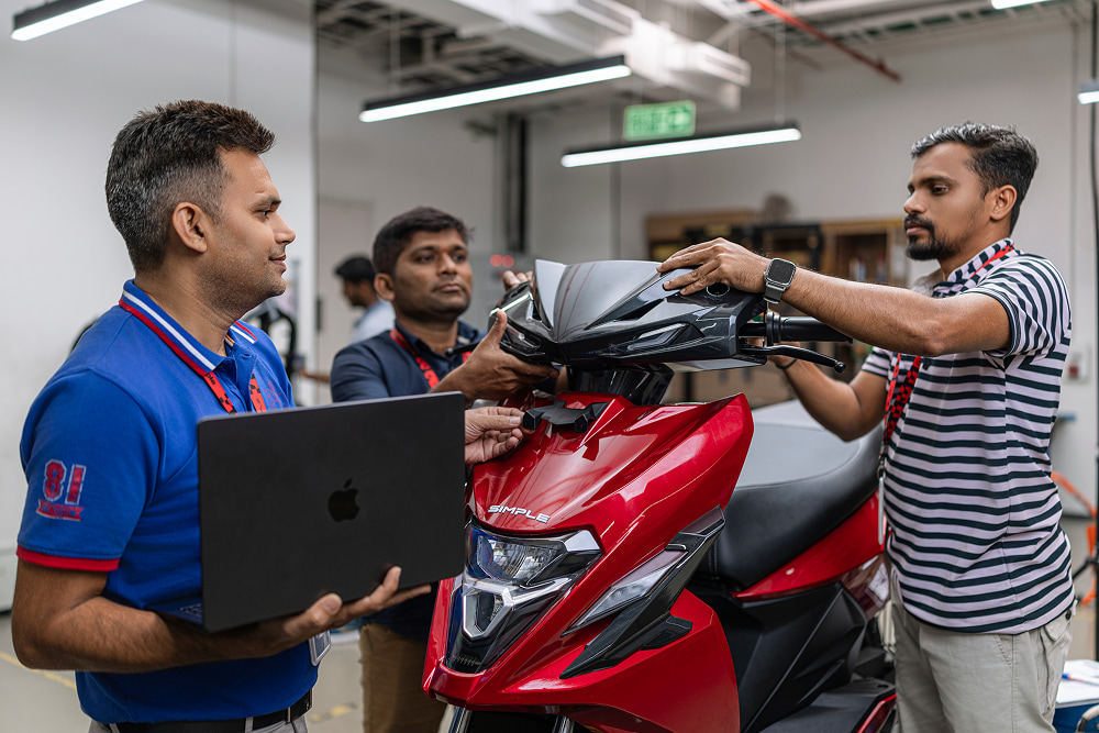 Simple One electric scooter in red at a technical inspection