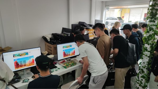 People viewing computer screen