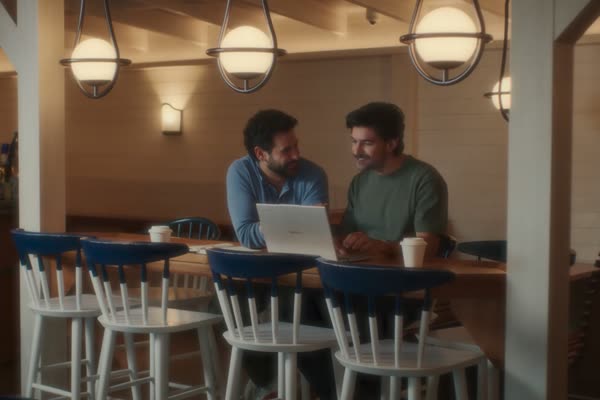 Virgin Voyages crew collaborating onboard