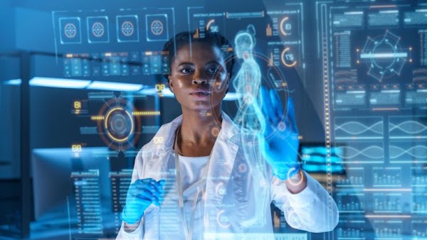 medical professional viewing virtual screen of health data