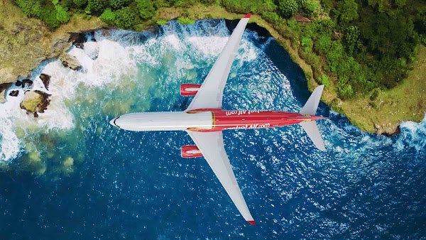 An airplane flying above water