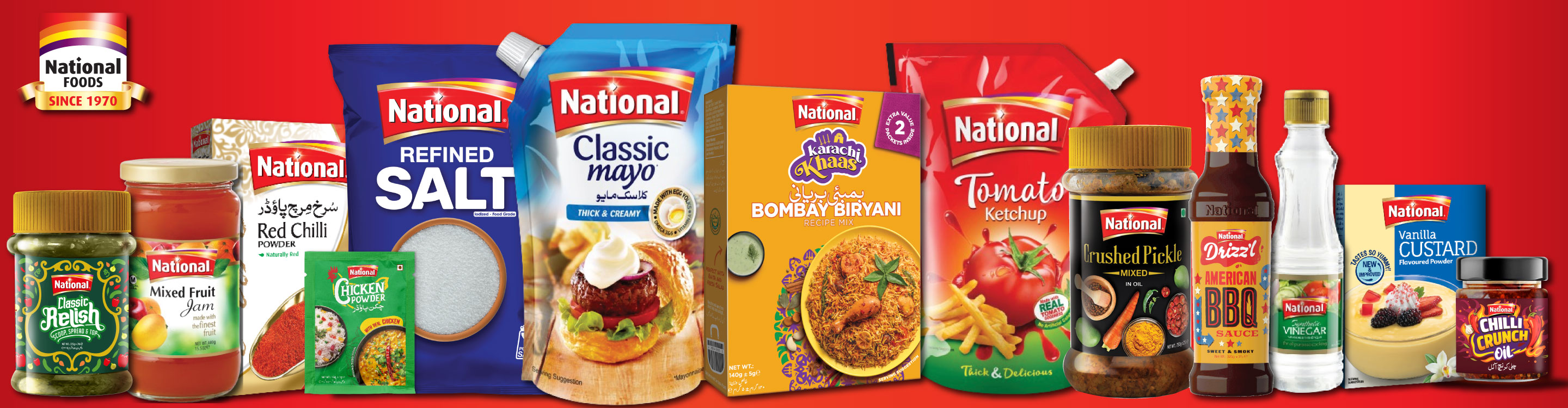 A red banner featuring an assortment of National Foods products, including condiments, spices, jams, salt, and mayonnaise