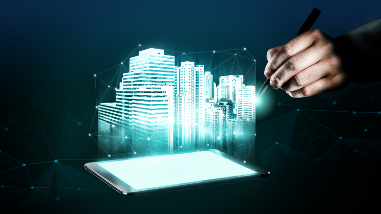 hand with stylus looking at a holographic city above a device