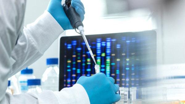 scientist using pipet to analyze genome data