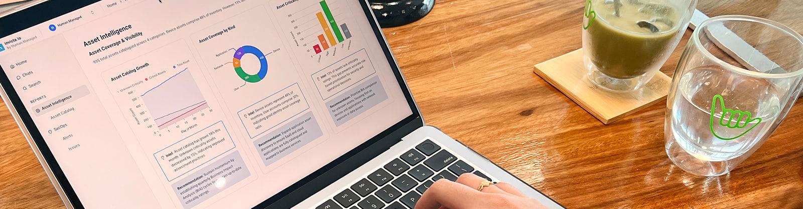 Laptop showing an Asset Intelligence data dashboard