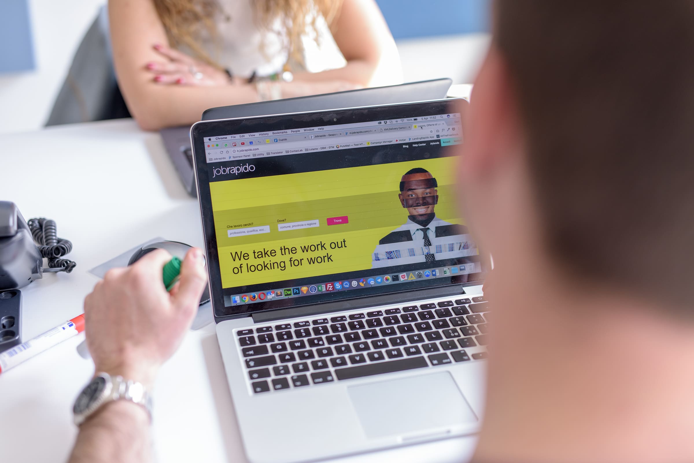 Person viewing Jobrapido website on laptop screen