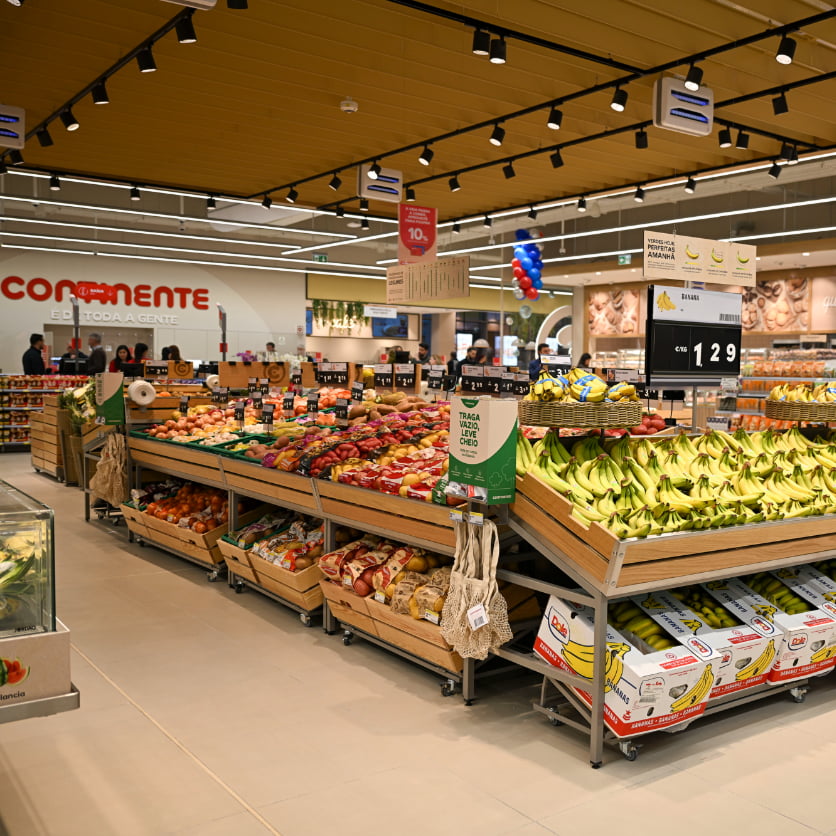 Inside a "Continente" store, showing colorful fruits