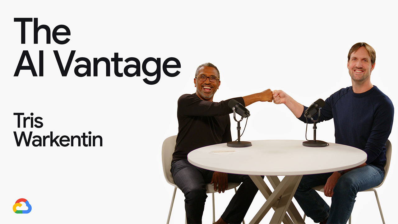 Two men fist bumping