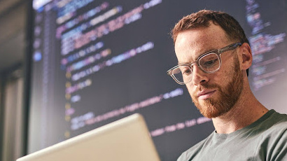 Man looking at laptop