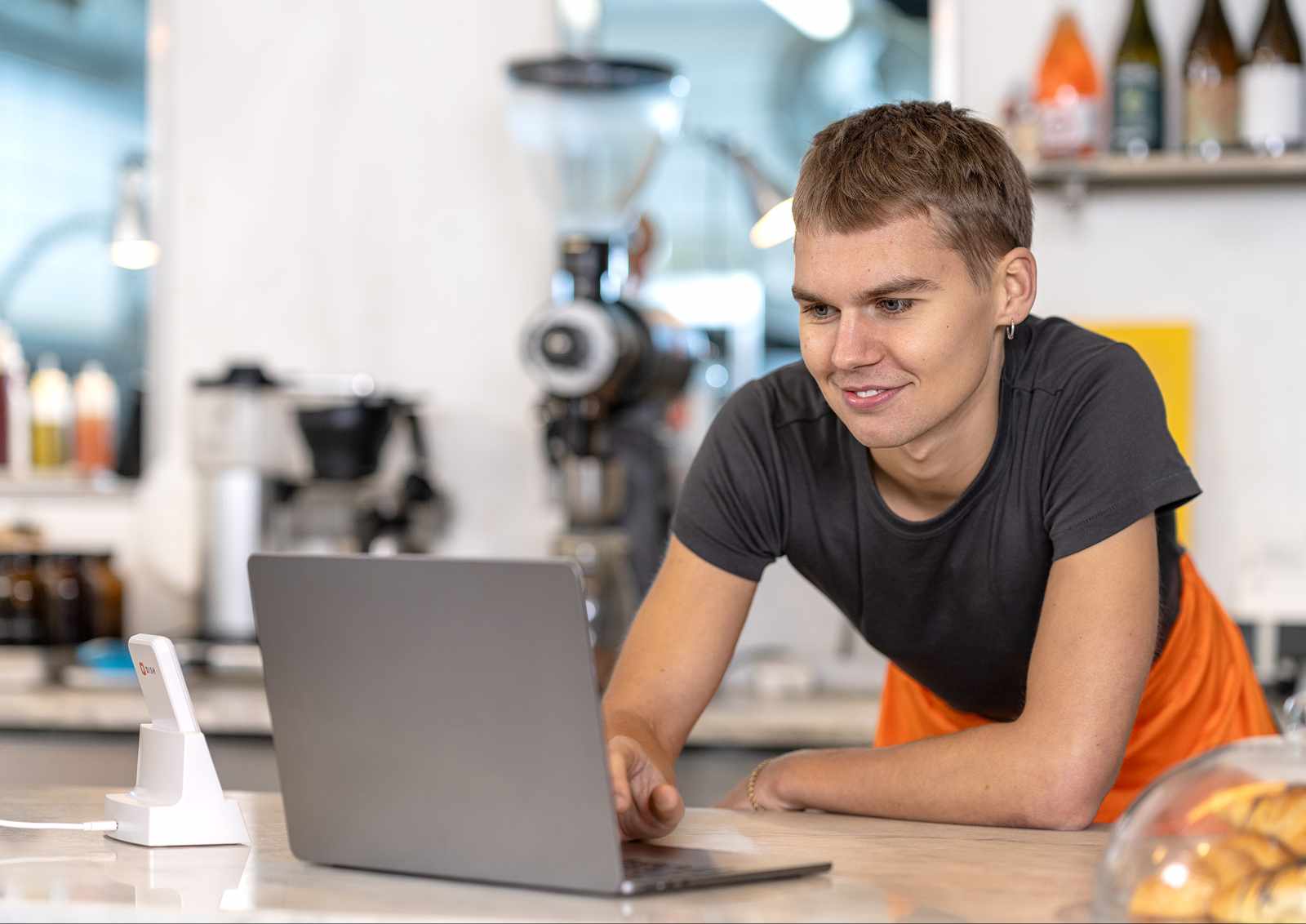 Counter staff watching the laptop