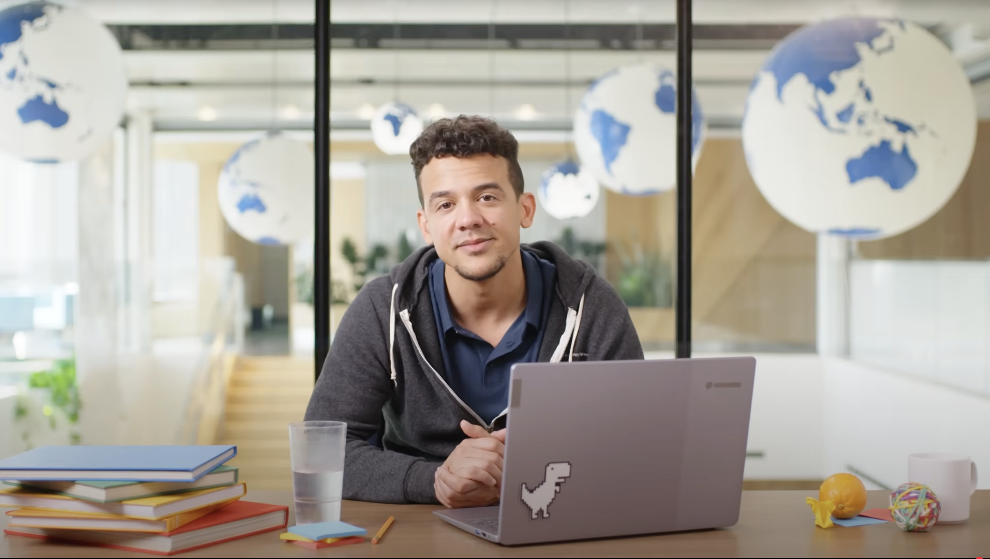 Guy sitting at desk with laptop