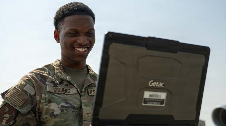 Service person using a laptop