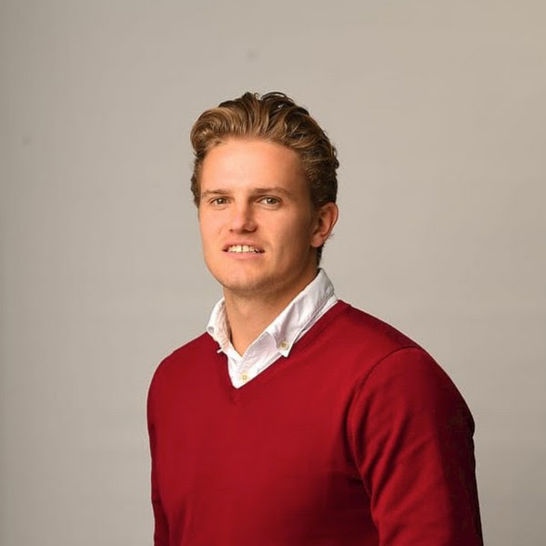 Men wearing a read jumper.