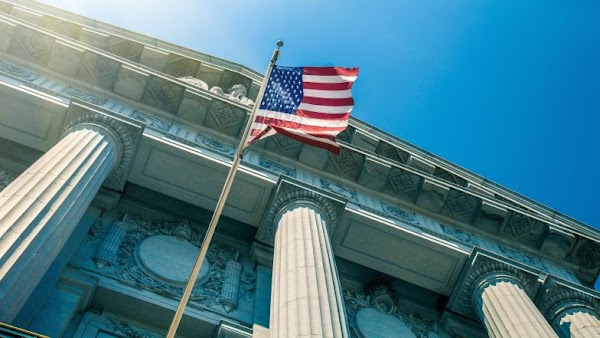 capitol building with American flag