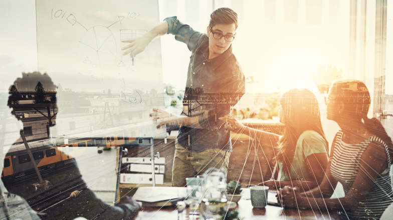 team member discussing planning with data overlaid over them