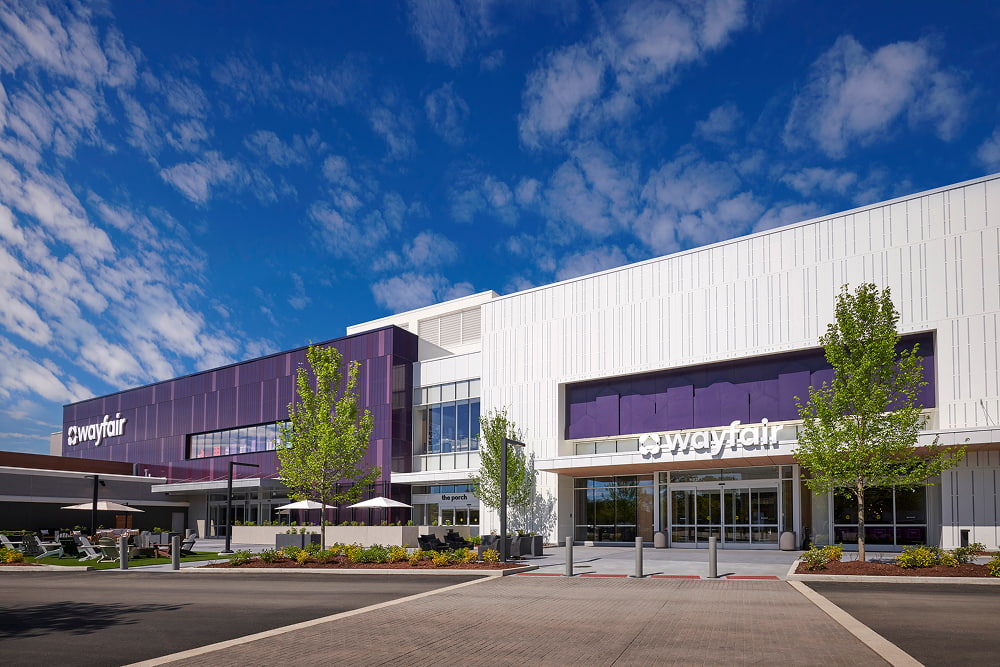 Wayfair large-format retail store exterior under blue sky
