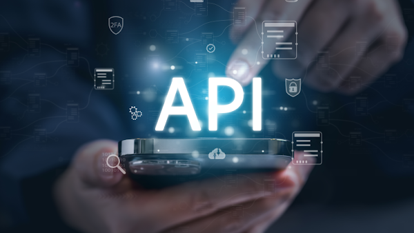 API hologram floating above hand holding phone