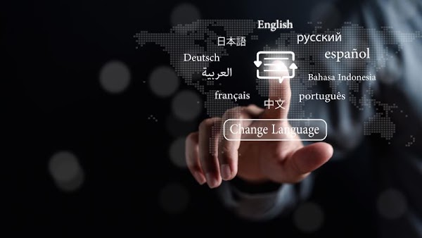 person pressing virtual button with language options