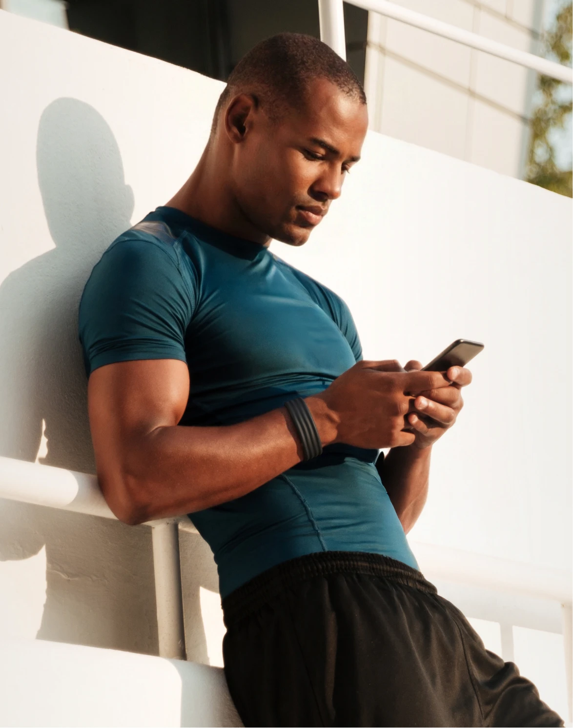 Image of man on his phone using the Google Health App. 