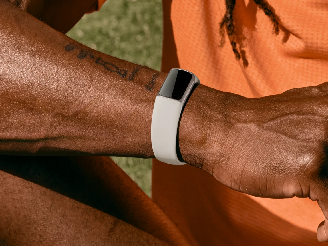 Image of man wearing Fitbit Charge 6
