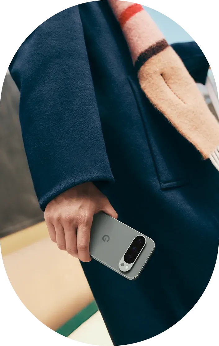 Person holding a smartphone with Theft Detection Lock feature activated