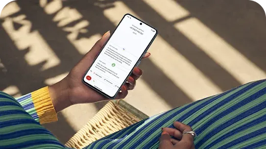 Woman uses her Android phone to send messages
