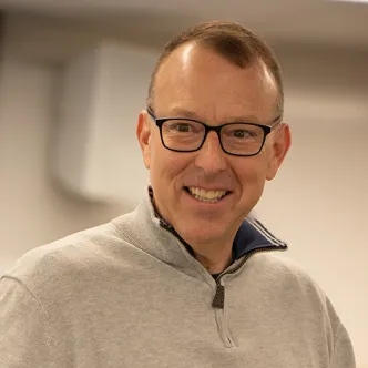  A photograph of Daniel Kelley, an Associate Teaching Professor of Educational Leadership and Policy at the University of Rhode Island.