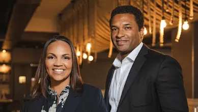 A man and woman standing in the picture