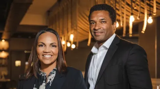 A man and woman standing in the picture