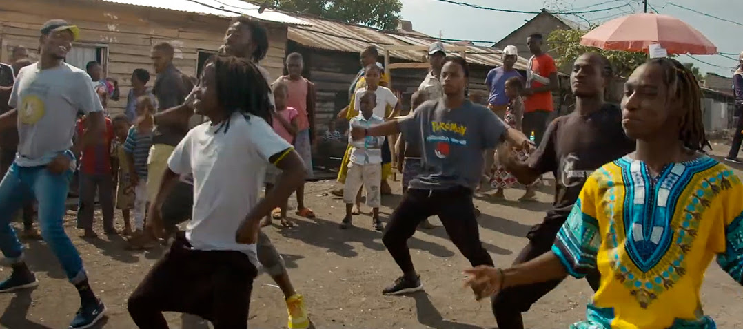 Image of Congolese dance group Street Dancers performing for onlookers