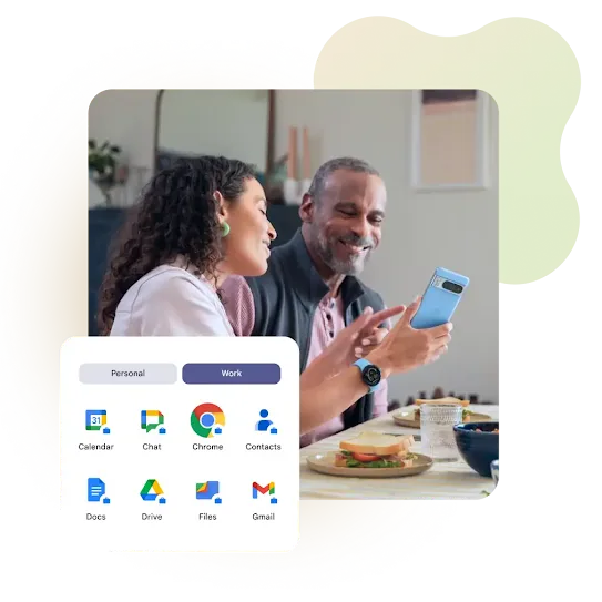 A man and a woman sitting at a table look at a smartphone, with an overlay showing app icons separated into 