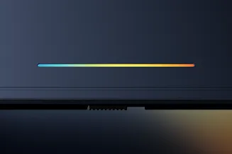 Close up of the glow bar on the laptop as it hinges open.
