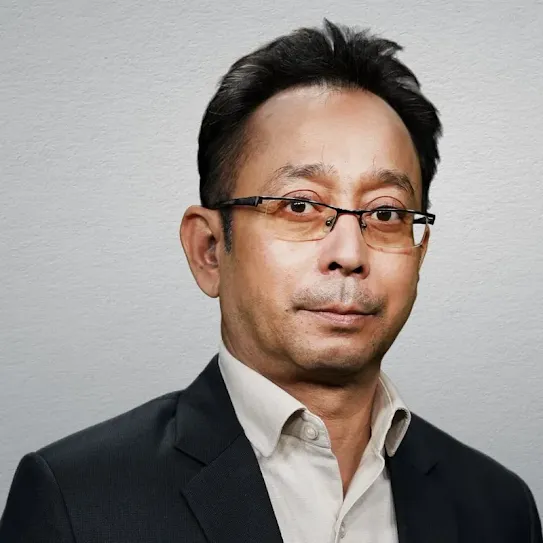 Professional headshot of Raktim Das, Chief Growth Officer of TV9 Network.