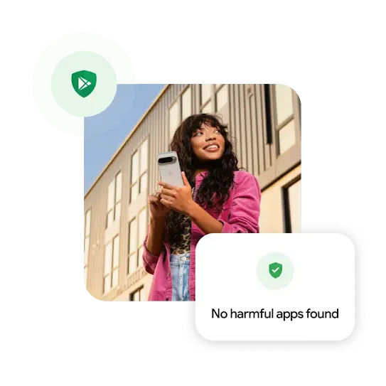 A person wearing jeans with a leopard print shirt underneath a pink corduroy jacket holds a Pixel phone while looking to the side. A building is in the background.