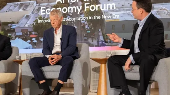 A photograph of Oren Cass, Jason Furman, Mike Spence and Fabien Curto Millet at the AI for the Economy Forum in Washington DC.