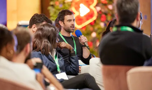 A man holding the mic in hand