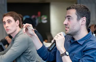 A participant is questioning the host.