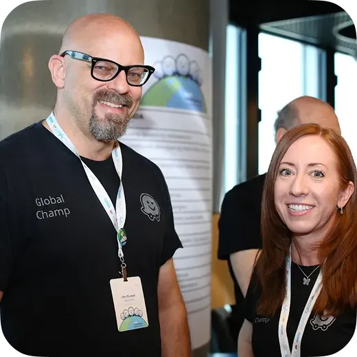 Waze Global Champ map editors holding badges at an official Waze community event