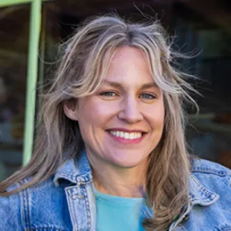 A photograph of Abby Thaxton, the co-owner of The Lucky Rabbit, a vintage store in Hattiesburg, Mississippi.
