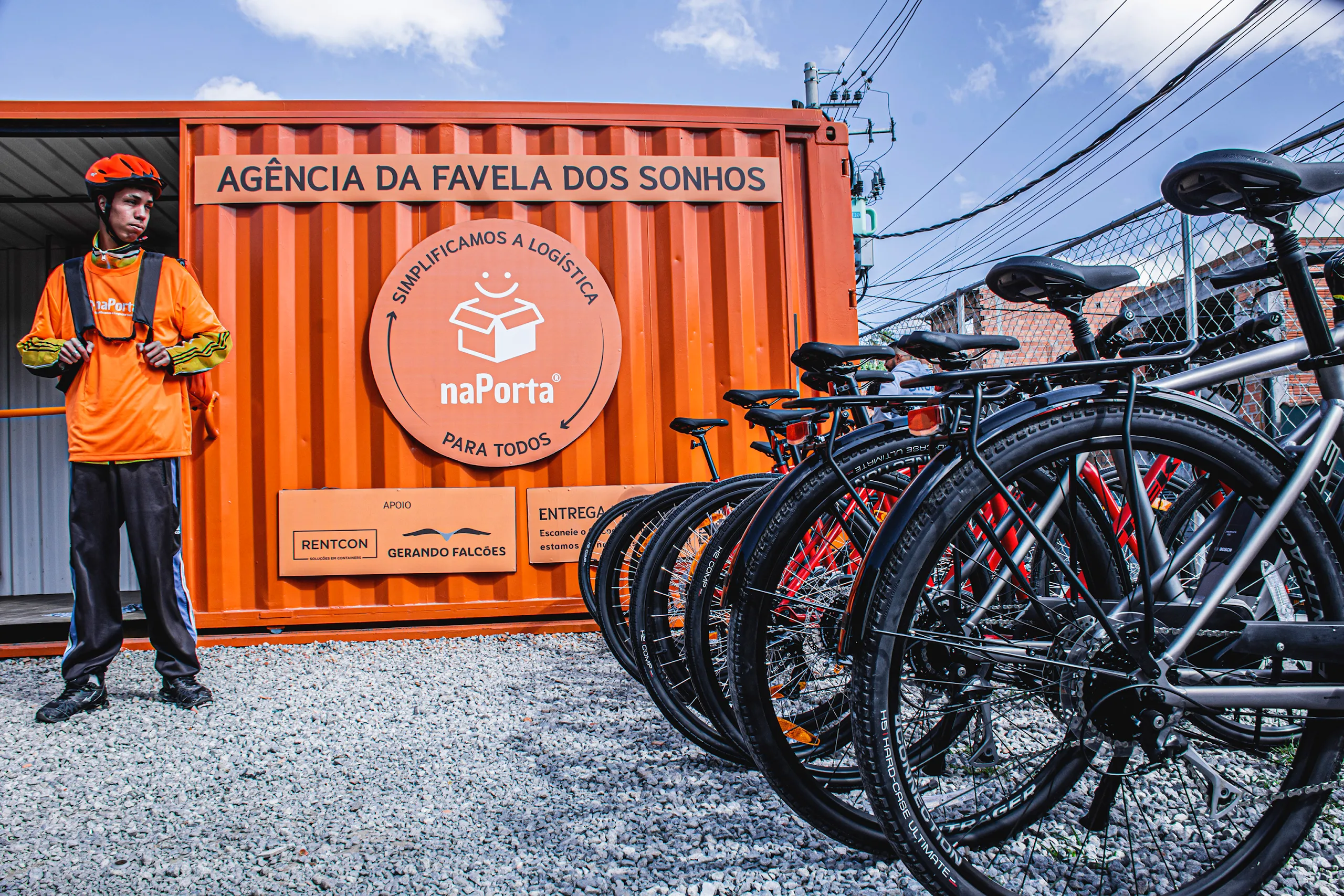 A naPorta courier prepares to make deliveries by bike