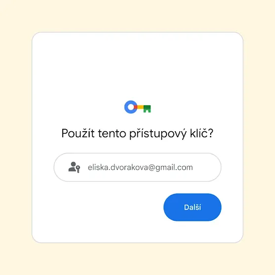 Uživatelské rozhraní s dotazem „Použít tento přístupový klíč?“ a tlačítkem Další.