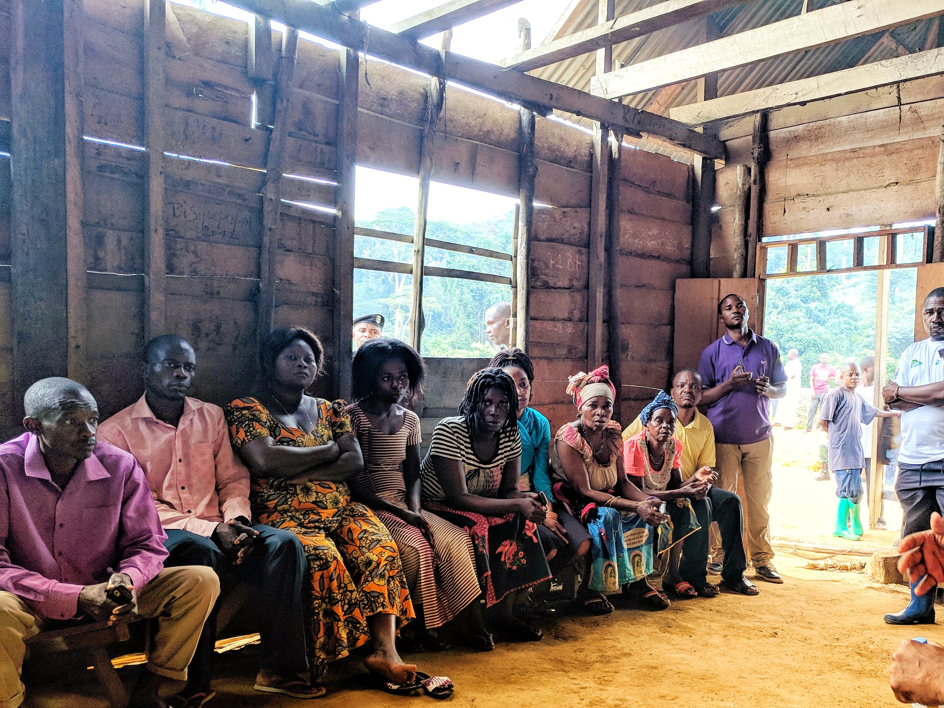 Residents of Ma Noire, a community transitioning away from a reliance on artisanal gold mining as the primary livelihood, meet to discuss community-development priorities.