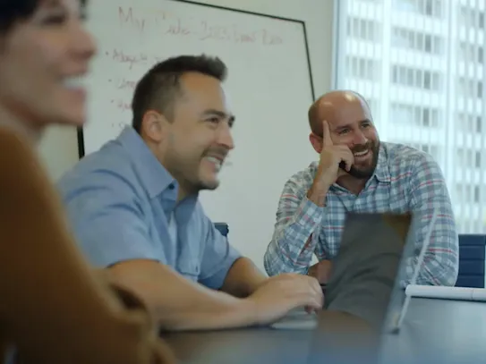 The My Code team in a meeting.